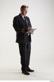 Jake Perry Pilot with iPad Pose 2 standing whole body…